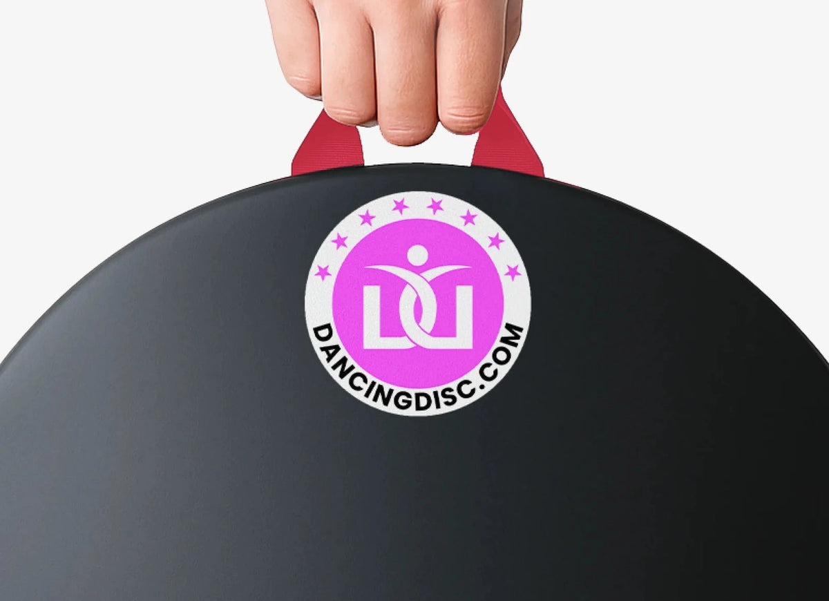The Dancing Disc seatbelt-style handle, in pink